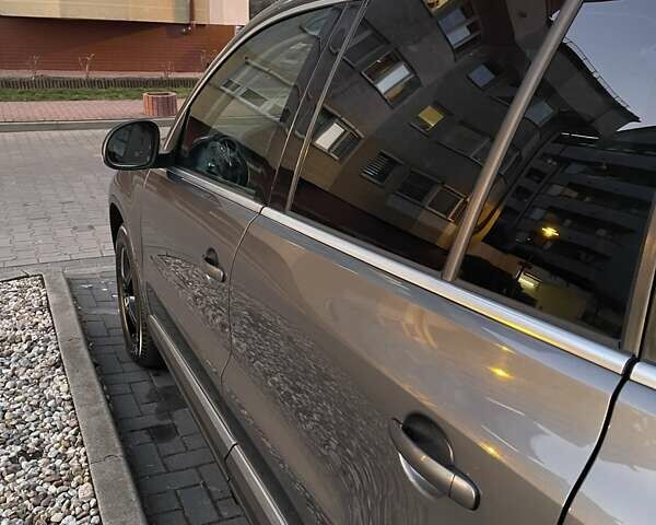 Серый Фольксваген Тигуан, объемом двигателя 1.97 л и пробегом 247 тыс. км за 14500 $, фото 53 на Automoto.ua