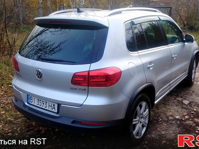 Серый Фольксваген Тигуан, объемом двигателя 2 л и пробегом 218 тыс. км за 10600 $, фото 2 на Automoto.ua