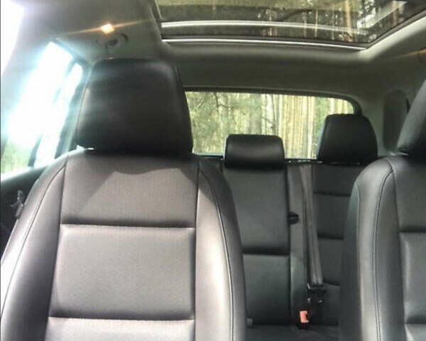 Серый Фольксваген Тигуан, объемом двигателя 1.98 л и пробегом 209 тыс. км за 12000 $, фото 2 на Automoto.ua