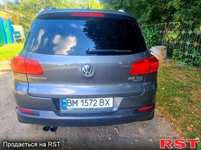 Серый Фольксваген Тигуан, объемом двигателя 2 л и пробегом 190 тыс. км за 14000 $, фото 5 на Automoto.ua