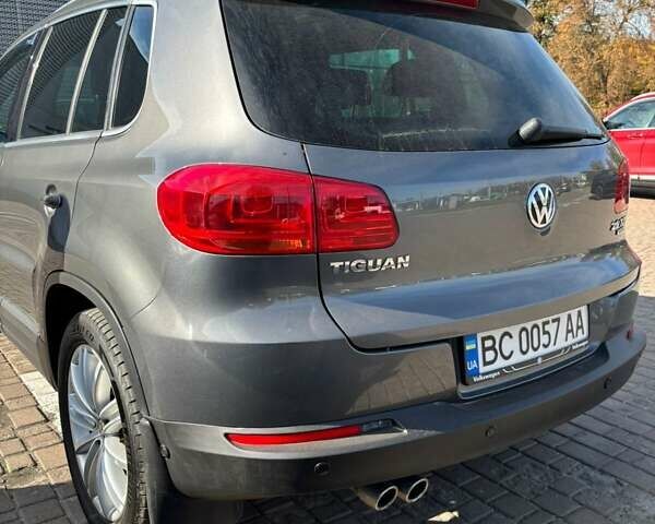 Серый Фольксваген Тигуан, объемом двигателя 1.97 л и пробегом 233 тыс. км за 16800 $, фото 4 на Automoto.ua