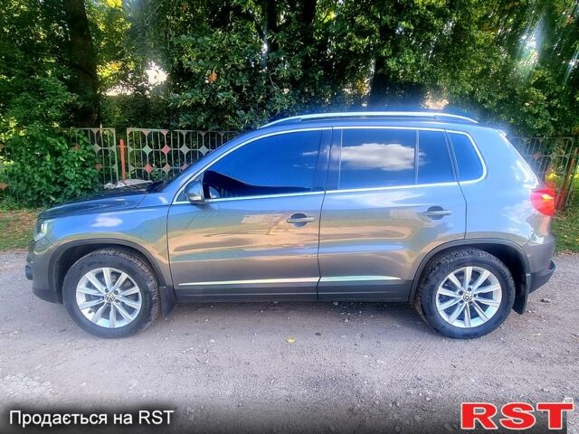 Серый Фольксваген Тигуан, объемом двигателя 2 л и пробегом 190 тыс. км за 14000 $, фото 4 на Automoto.ua