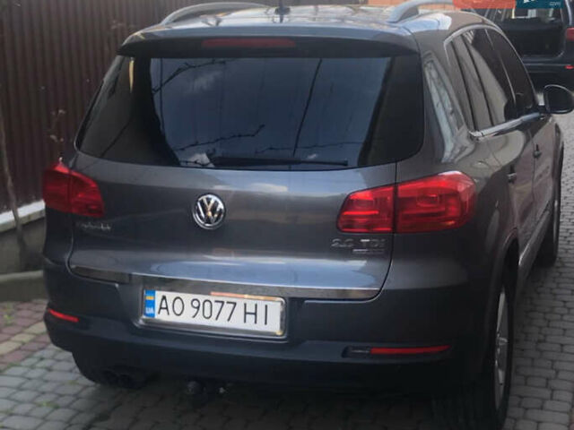 Сірий Фольксваген Тігуан, об'ємом двигуна 2 л та пробігом 172 тис. км за 15000 $, фото 1 на Automoto.ua