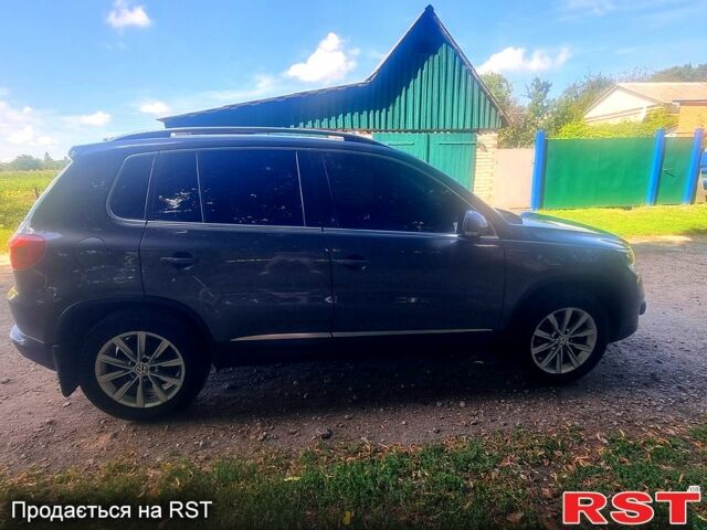 Серый Фольксваген Тигуан, объемом двигателя 2 л и пробегом 190 тыс. км за 14000 $, фото 2 на Automoto.ua