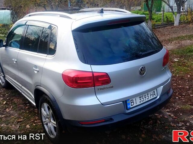Серый Фольксваген Тигуан, объемом двигателя 2 л и пробегом 218 тыс. км за 10600 $, фото 1 на Automoto.ua