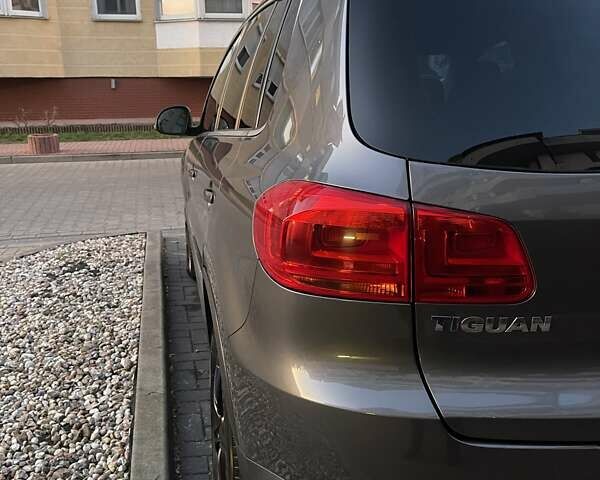 Серый Фольксваген Тигуан, объемом двигателя 1.97 л и пробегом 247 тыс. км за 14500 $, фото 49 на Automoto.ua