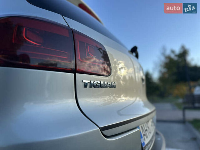 Сірий Фольксваген Тігуан, об'ємом двигуна 2 л та пробігом 180 тис. км за 10699 $, фото 1 на Automoto.ua