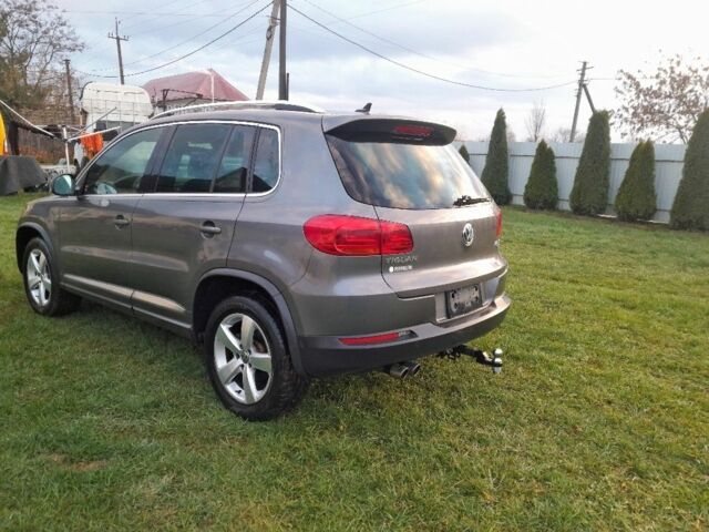 Серый Фольксваген Тигуан, объемом двигателя 2 л и пробегом 140 тыс. км за 12800 $, фото 2 на Automoto.ua