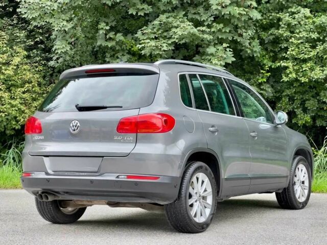 Сірий Фольксваген Тігуан, об'ємом двигуна 2 л та пробігом 83 тис. км за 9100 $, фото 2 на Automoto.ua
