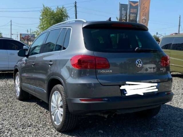 Сірий Фольксваген Тігуан, об'ємом двигуна 2 л та пробігом 166 тис. км за 13900 $, фото 2 на Automoto.ua