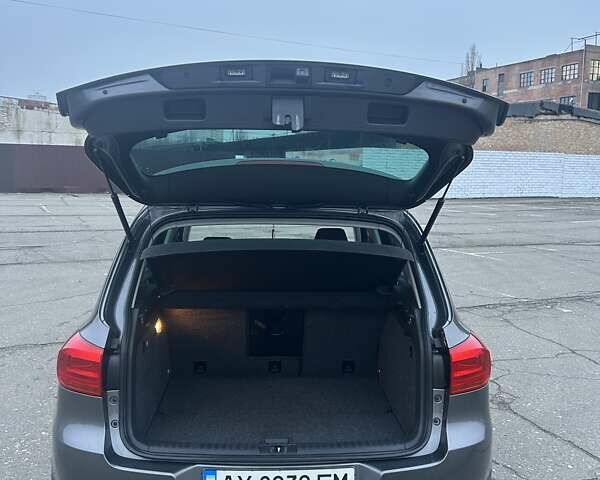 Серый Фольксваген Тигуан, объемом двигателя 1.97 л и пробегом 144 тыс. км за 16000 $, фото 26 на Automoto.ua