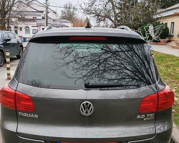 Серый Фольксваген Тигуан, объемом двигателя 1.98 л и пробегом 170 тыс. км за 12500 $, фото 3 на Automoto.ua