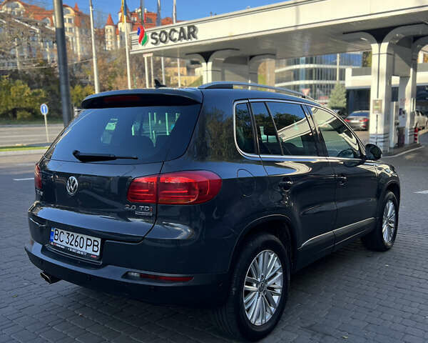 Серый Фольксваген Тигуан, объемом двигателя 2 л и пробегом 299 тыс. км за 13600 $, фото 2 на Automoto.ua