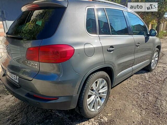 Серый Фольксваген Тигуан, объемом двигателя 1.97 л и пробегом 145 тыс. км за 17500 $, фото 2 на Automoto.ua