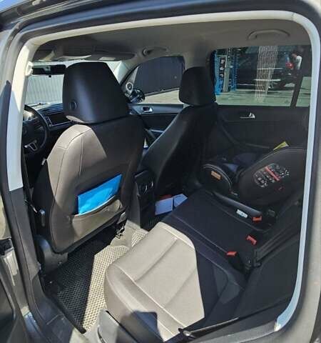 Серый Фольксваген Тигуан, объемом двигателя 1.98 л и пробегом 193 тыс. км за 14500 $, фото 16 на Automoto.ua