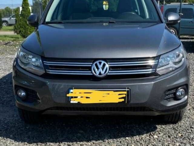 Сірий Фольксваген Тігуан, об'ємом двигуна 2 л та пробігом 166 тис. км за 13900 $, фото 1 на Automoto.ua