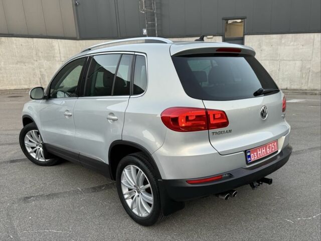 Сірий Фольксваген Тігуан, об'ємом двигуна 2 л та пробігом 250 тис. км за 10500 $, фото 2 на Automoto.ua