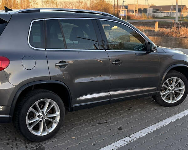 Серый Фольксваген Тигуан, объемом двигателя 2 л и пробегом 163 тыс. км за 14300 $, фото 5 на Automoto.ua