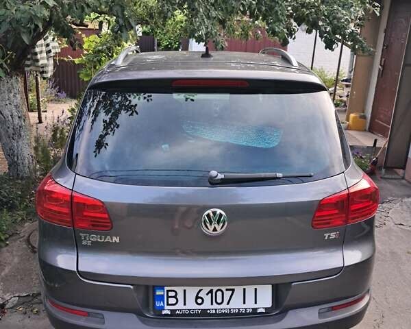 Серый Фольксваген Тигуан, объемом двигателя 1.98 л и пробегом 198 тыс. км за 14500 $, фото 8 на Automoto.ua