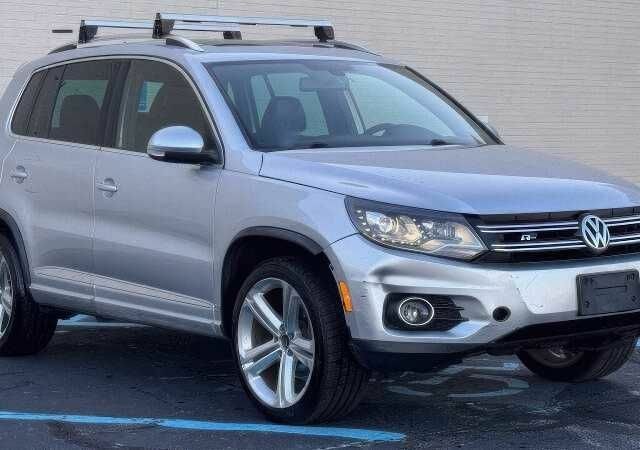 Серый Фольксваген Тигуан, объемом двигателя 2 л и пробегом 99 тыс. км за 7500 $, фото 2 на Automoto.ua