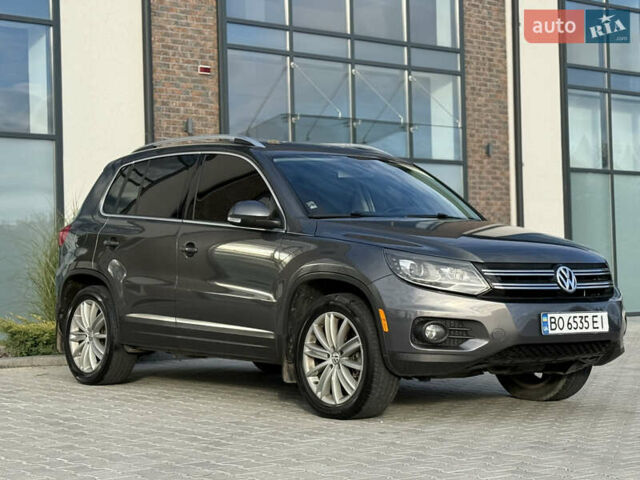 Сірий Фольксваген Тігуан, об'ємом двигуна 2 л та пробігом 176 тис. км за 12400 $, фото 2 на Automoto.ua