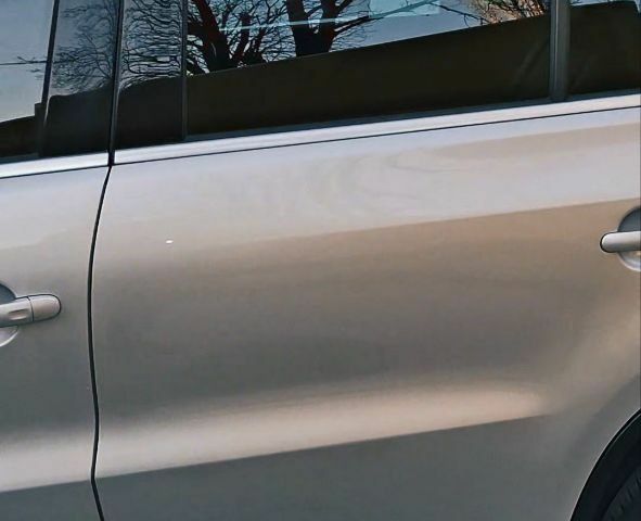 Серый Фольксваген Тигуан, объемом двигателя 2 л и пробегом 121 тыс. км за 13500 $, фото 2 на Automoto.ua