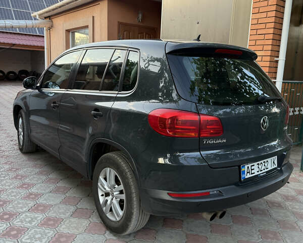 Сірий Фольксваген Тігуан, об'ємом двигуна 1.99 л та пробігом 250 тис. км за 14500 $, фото 4 на Automoto.ua