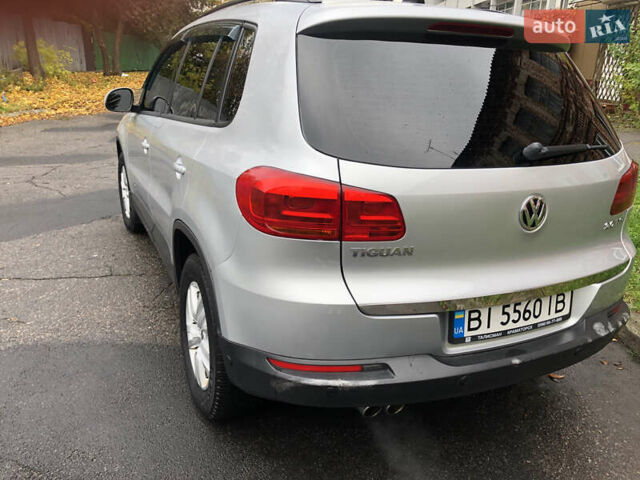 Сірий Фольксваген Тігуан, об'ємом двигуна 1.98 л та пробігом 197 тис. км за 13500 $, фото 7 на Automoto.ua