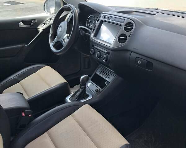 Серый Фольксваген Тигуан, объемом двигателя 1.98 л и пробегом 198 тыс. км за 14500 $, фото 17 на Automoto.ua