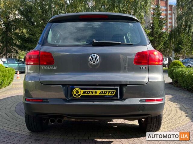 Сірий Фольксваген Тігуан, об'ємом двигуна 2 л та пробігом 243 тис. км за 13200 $, фото 5 на Automoto.ua