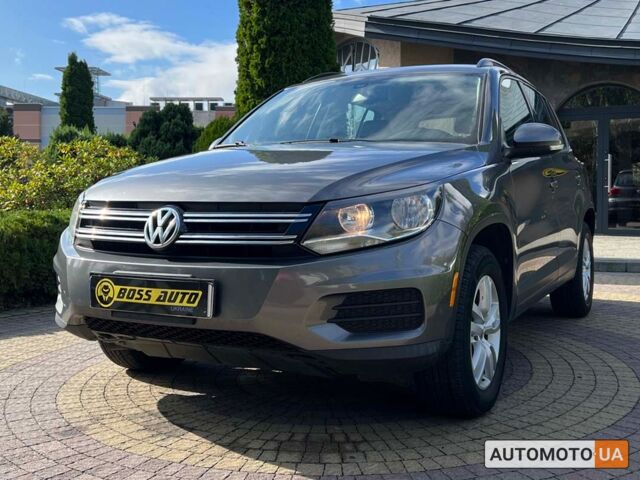 Сірий Фольксваген Тігуан, об'ємом двигуна 2 л та пробігом 243 тис. км за 13200 $, фото 2 на Automoto.ua