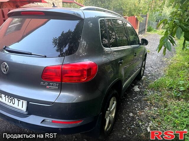 Серый Фольксваген Тигуан, объемом двигателя 2 л и пробегом 159 тыс. км за 16000 $, фото 1 на Automoto.ua