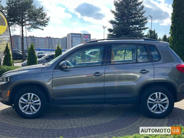 Сірий Фольксваген Тігуан, об'ємом двигуна 2 л та пробігом 243 тис. км за 13200 $, фото 3 на Automoto.ua