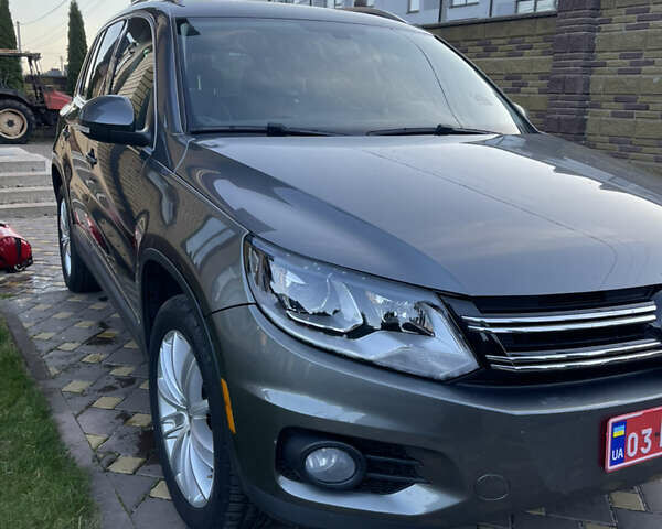 Сірий Фольксваген Тігуан, об'ємом двигуна 2 л та пробігом 205 тис. км за 10800 $, фото 5 на Automoto.ua