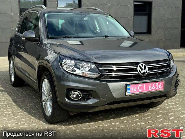 Серый Фольксваген Тигуан, объемом двигателя 2 л и пробегом 160 тыс. км за 13500 $, фото 2 на Automoto.ua