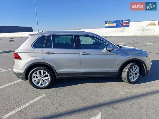 Сірий Фольксваген Тігуан, об'ємом двигуна 1.98 л та пробігом 298 тис. км за 23800 $, фото 7 на Automoto.ua