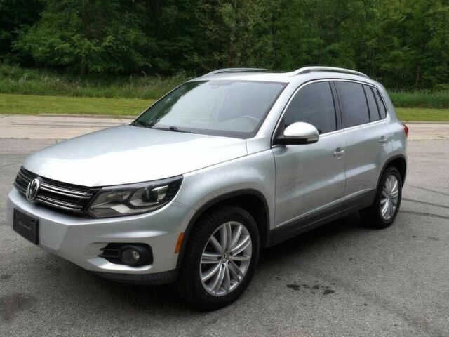 Серый Фольксваген Тигуан, объемом двигателя 2 л и пробегом 77 тыс. км за 4500 $, фото 2 на Automoto.ua