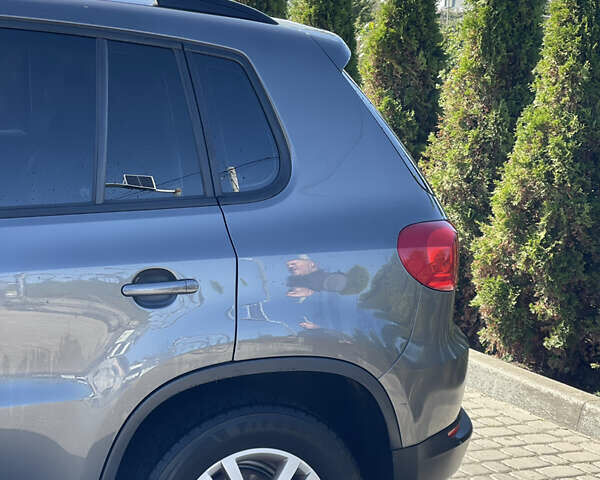 Сірий Фольксваген Тігуан, об'ємом двигуна 1.98 л та пробігом 148 тис. км за 13000 $, фото 5 на Automoto.ua