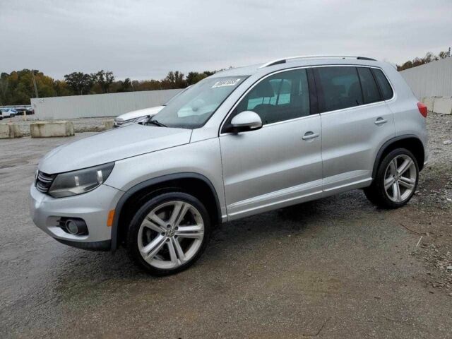 Сірий Фольксваген Тігуан, об'ємом двигуна 2 л та пробігом 126 тис. км за 3000 $, фото 1 на Automoto.ua