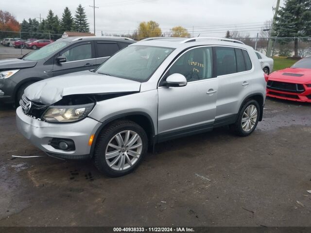 Сірий Фольксваген Тігуан, об'ємом двигуна 2 л та пробігом 151 тис. км за 10800 $, фото 2 на Automoto.ua