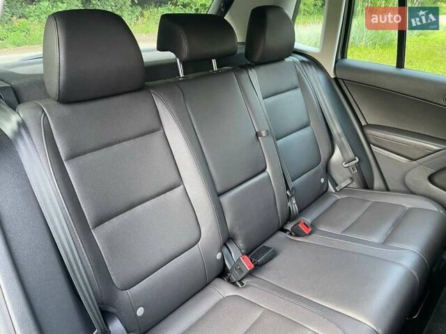 Сірий Фольксваген Тігуан, об'ємом двигуна 2 л та пробігом 133 тис. км за 13499 $, фото 24 на Automoto.ua