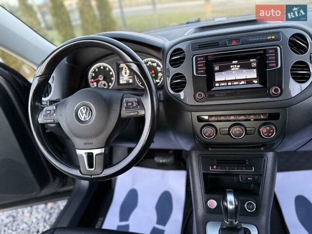 Серый Фольксваген Тигуан, объемом двигателя 2 л и пробегом 135 тыс. км за 11950 $, фото 68 на Automoto.ua