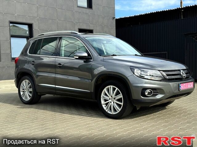 Серый Фольксваген Тигуан, объемом двигателя 2 л и пробегом 160 тыс. км за 13500 $, фото 1 на Automoto.ua