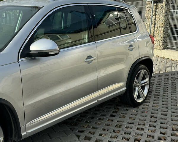 Сірий Фольксваген Тігуан, об'ємом двигуна 2 л та пробігом 175 тис. км за 12750 $, фото 4 на Automoto.ua