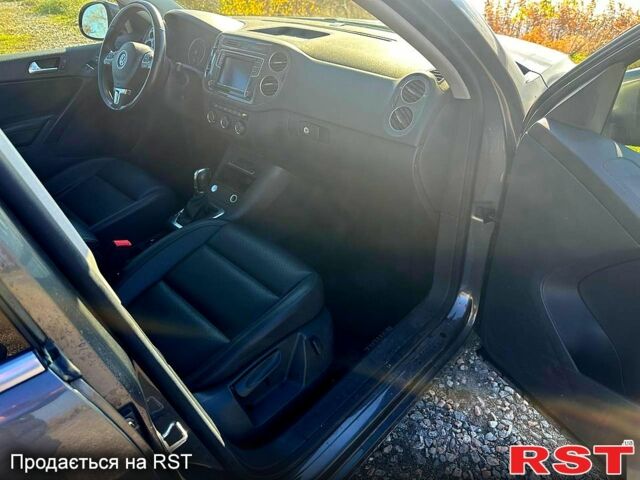 Серый Фольксваген Тигуан, объемом двигателя 2 л и пробегом 195 тыс. км за 13000 $, фото 9 на Automoto.ua