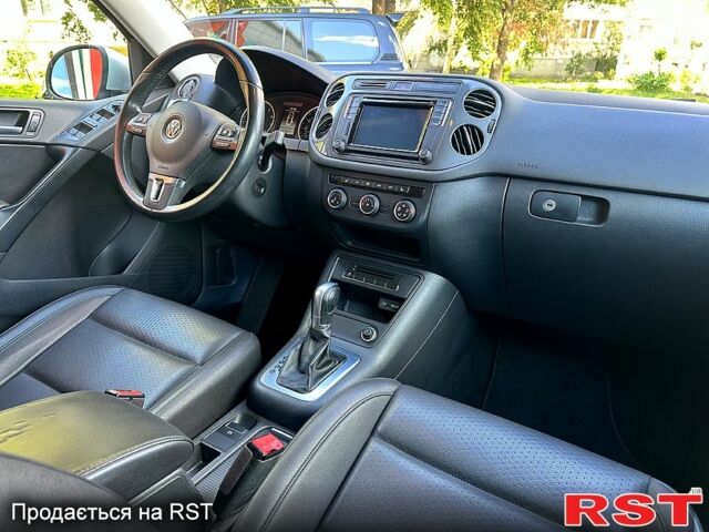 Сірий Фольксваген Тігуан, об'ємом двигуна 2 л та пробігом 190 тис. км за 13700 $, фото 7 на Automoto.ua