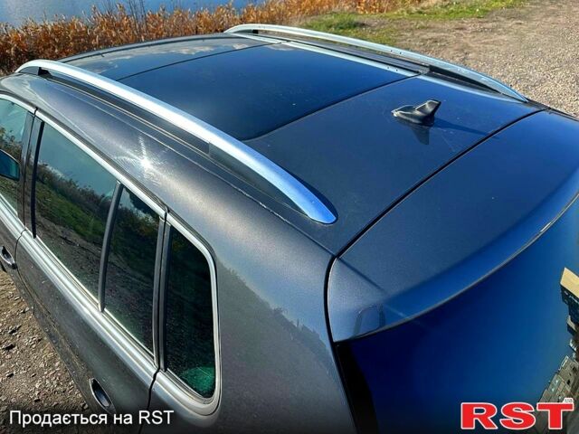 Серый Фольксваген Тигуан, объемом двигателя 2 л и пробегом 195 тыс. км за 13000 $, фото 4 на Automoto.ua