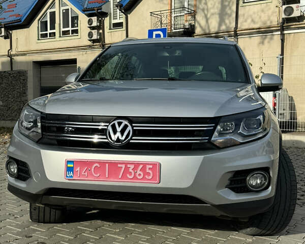 Сірий Фольксваген Тігуан, об'ємом двигуна 2 л та пробігом 175 тис. км за 12750 $, фото 2 на Automoto.ua