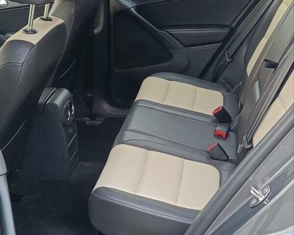 Сірий Фольксваген Тігуан, об'ємом двигуна 2 л та пробігом 205 тис. км за 12200 $, фото 25 на Automoto.ua