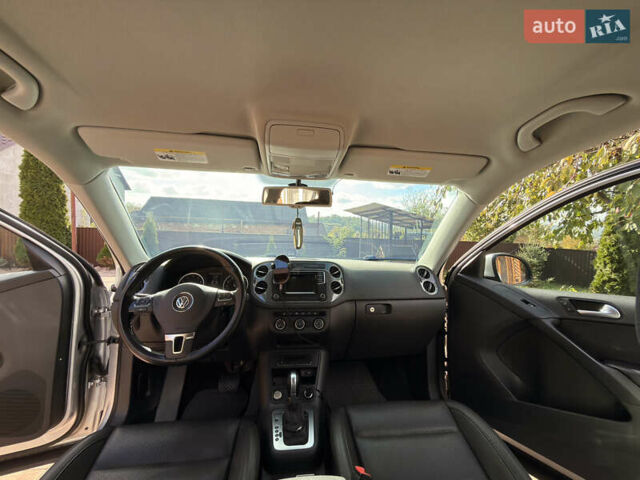 Серый Фольксваген Тигуан, объемом двигателя 1.98 л и пробегом 142 тыс. км за 12800 $, фото 26 на Automoto.ua